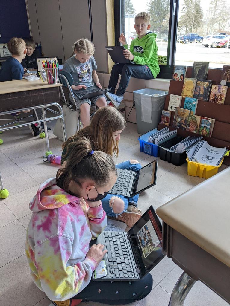In their fantasy book clubs, Ms. Norton's fifth grade class has been doing a wonderful job creating slide shows that map out the internal and external "quests" their main characters are on! 